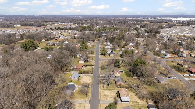 birds eye view of property with a residential view