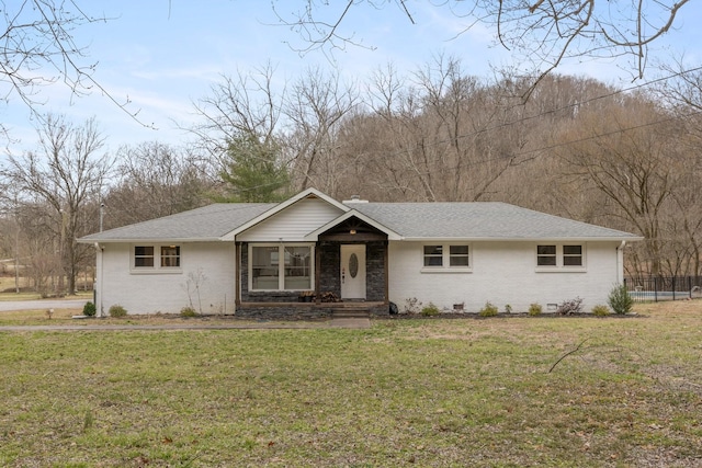 single story home with roof with shingles, brick siding, crawl space, and a front yard