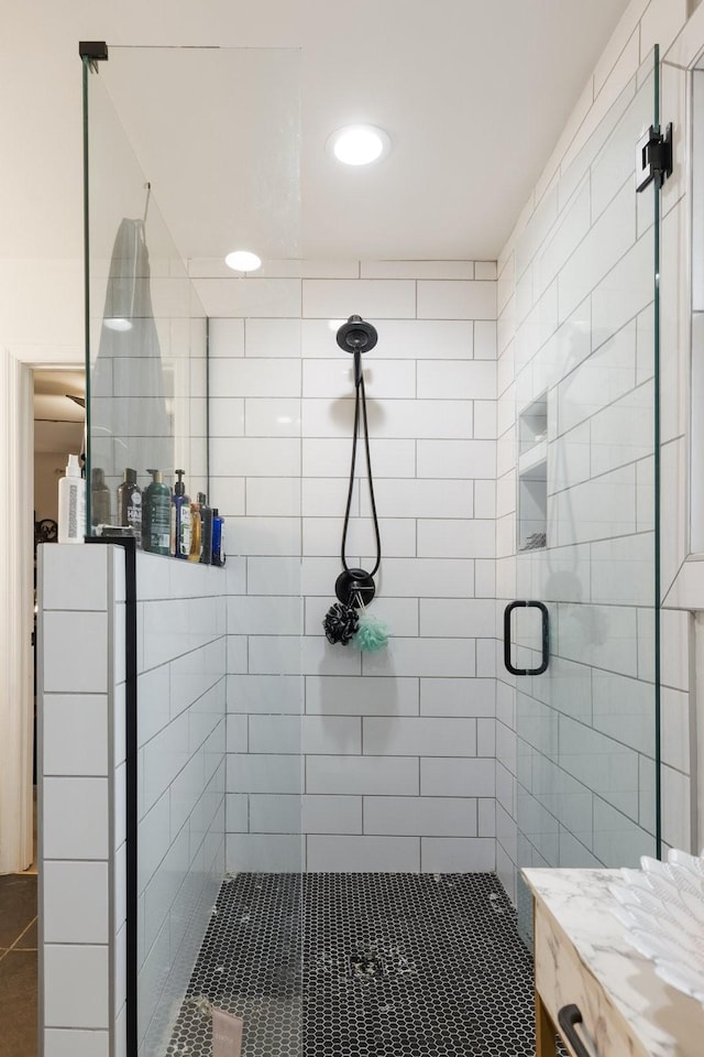 full bathroom with a shower stall