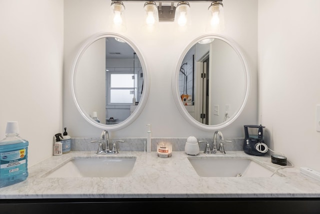 full bath featuring a sink and double vanity