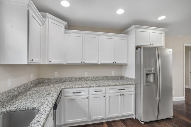 kitchen featuring dark wood finished floors, white cabinets, and stainless steel appliances