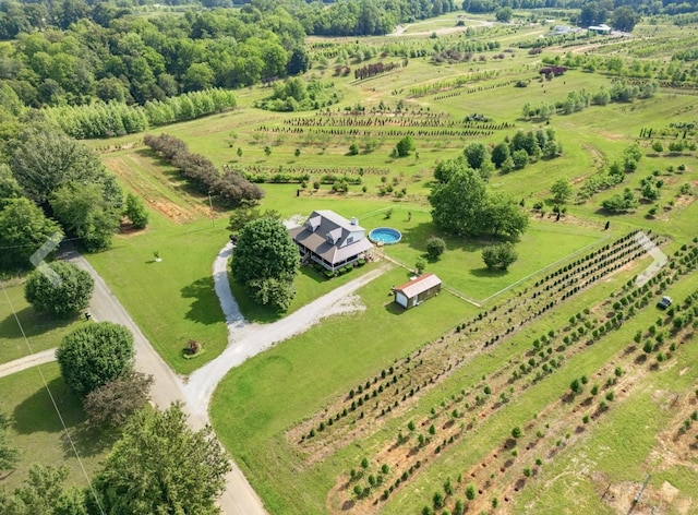 birds eye view of property featuring a rural view