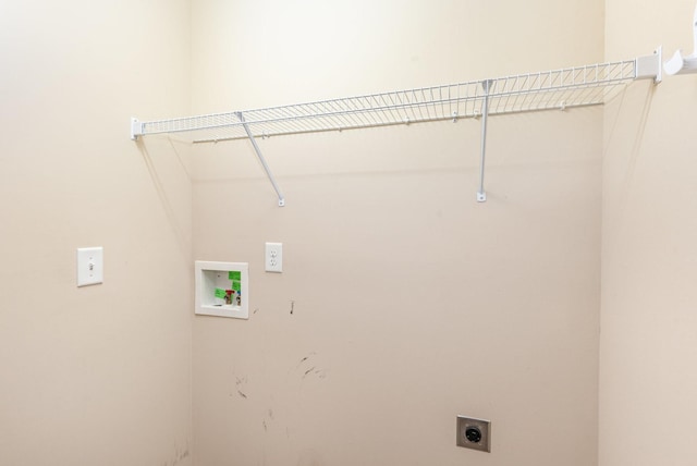 clothes washing area with washer hookup, laundry area, and electric dryer hookup