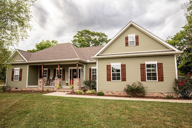 3215 Church St, Burns, TN 37029 - view of front of property with a front yard, crawl space, covered porch, and roof with shingles
