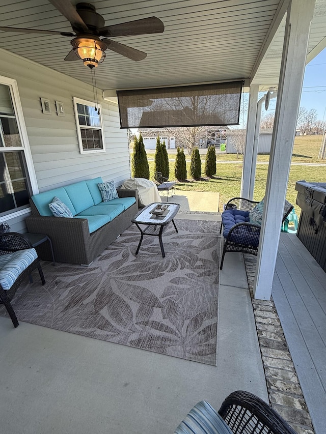 view of patio / terrace with a ceiling fan and outdoor lounge area