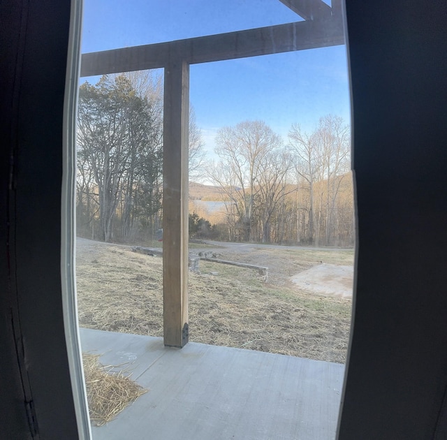 doorway to outside with wood finished floors