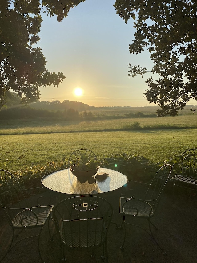 view of patio / terrace featuring a rural view