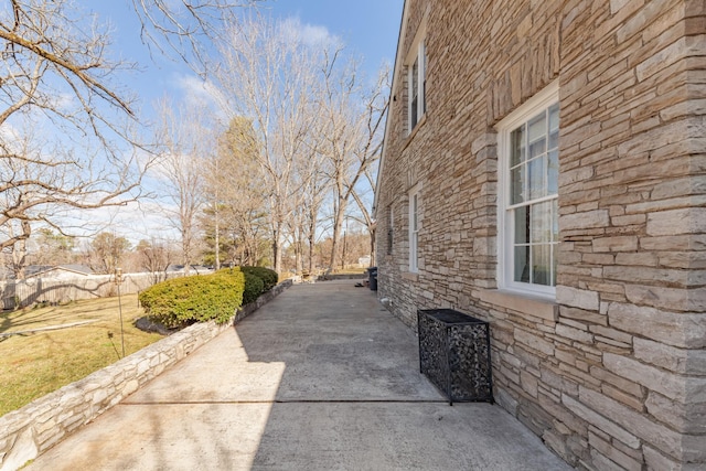 view of home's exterior with stone siding