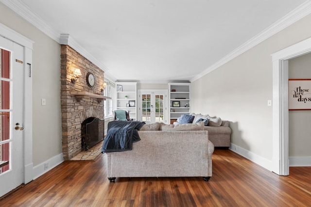 living area featuring crown molding, dark wood-style floors, and french doors