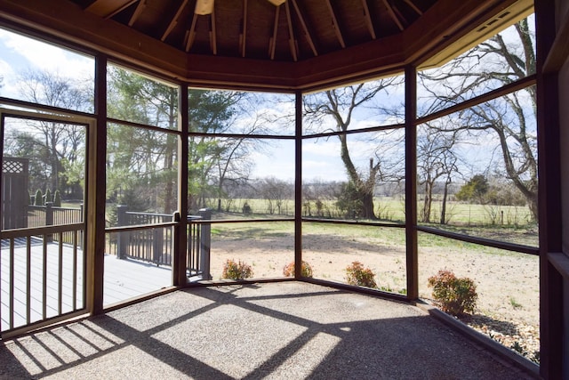 unfurnished sunroom featuring plenty of natural light