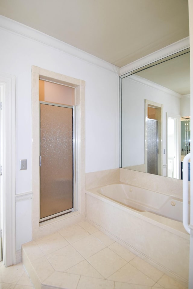 full bathroom featuring a stall shower, ornamental molding, tile patterned flooring, and a bath