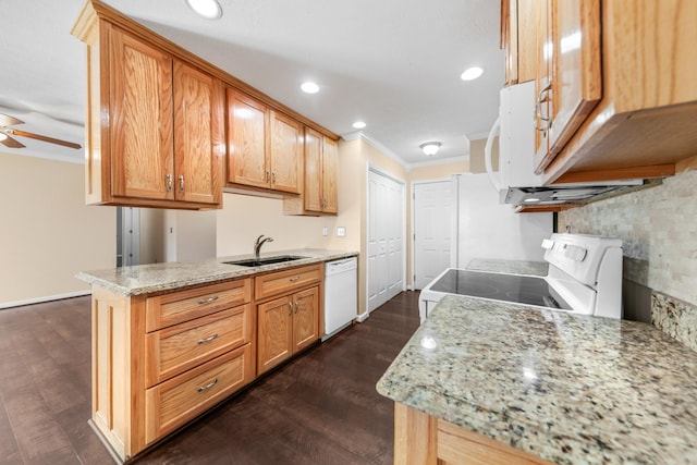 kitchen with white appliances, a ceiling fan, dark wood-style flooring, ornamental molding, and a sink