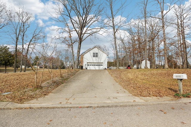 view of road featuring aphalt driveway