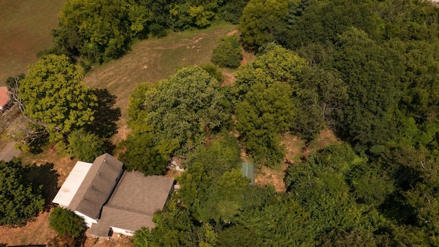 bird's eye view featuring a forest view