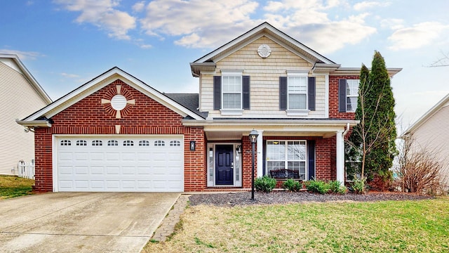 traditional-style home with brick siding, driveway, an attached garage, and a front lawn