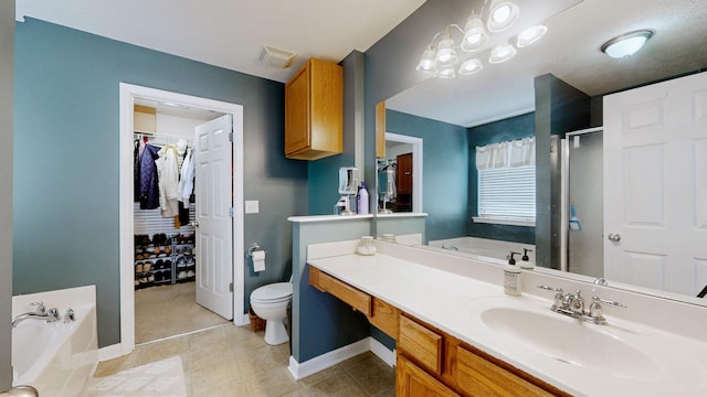 bathroom featuring visible vents, a garden tub, a shower stall, and vanity