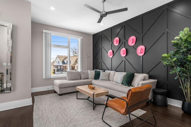 living area with recessed lighting, a ceiling fan, dark wood-type flooring, and baseboards