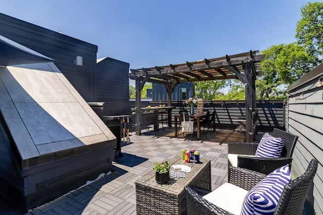 view of patio featuring outdoor dining space, an outdoor living space, and a pergola