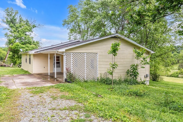 exterior space with a yard