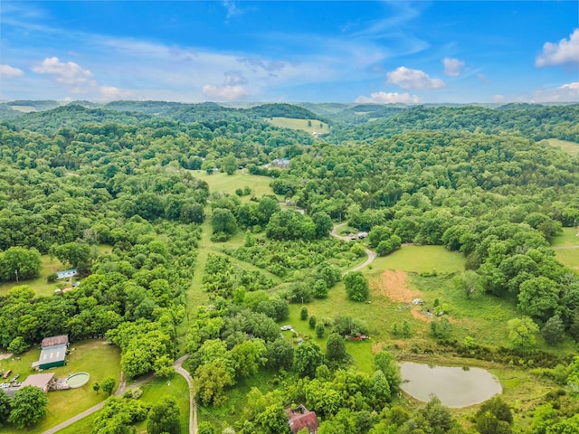 aerial view featuring a view of trees