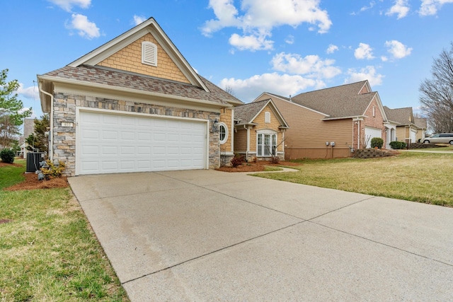 view of front of home featuring a front lawn, stone siding, concrete driveway, an attached garage, and central AC unit