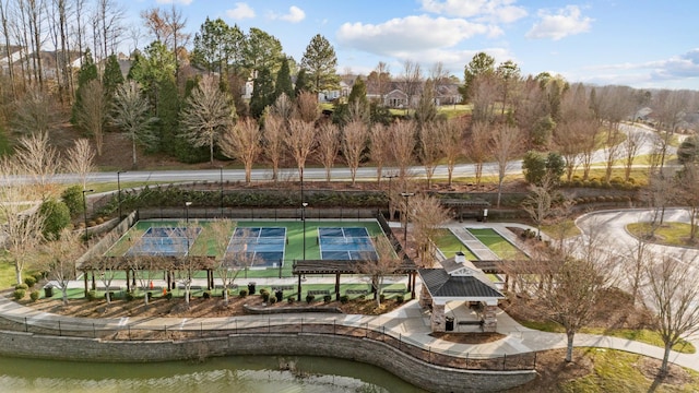 view of pool featuring a water view