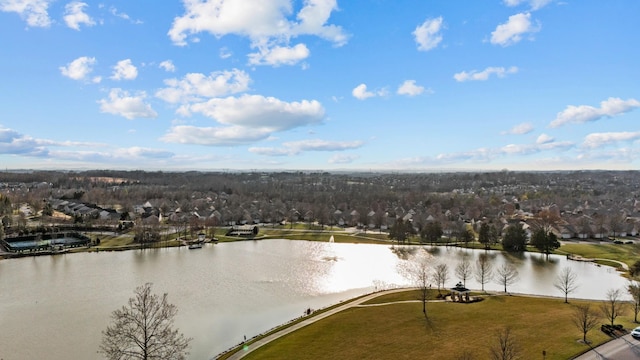 drone / aerial view with a residential view and a water view