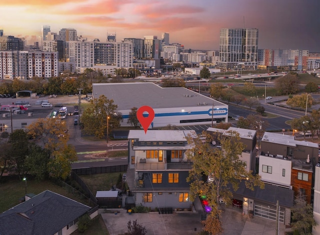 aerial view at dusk with a view of city