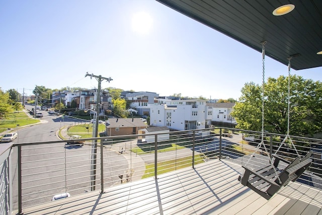 balcony featuring a residential view