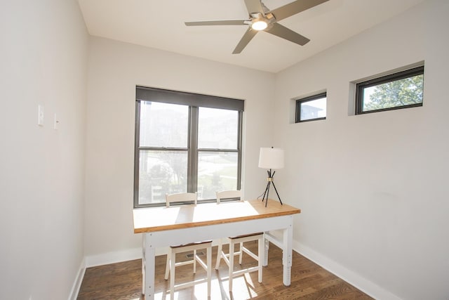 office area with ceiling fan, baseboards, and wood finished floors