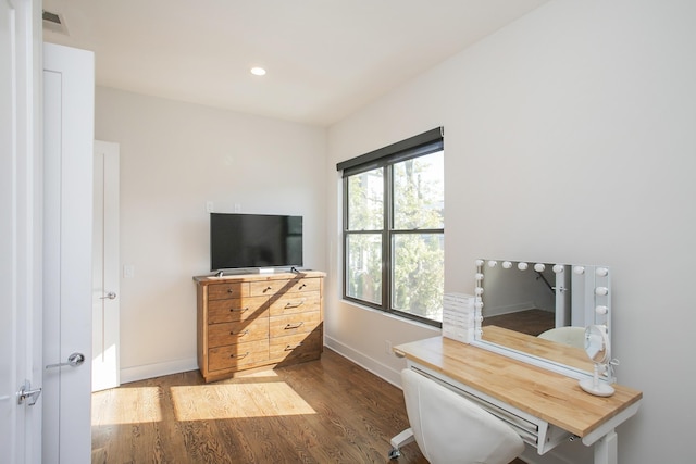 office area featuring recessed lighting, visible vents, baseboards, and wood finished floors