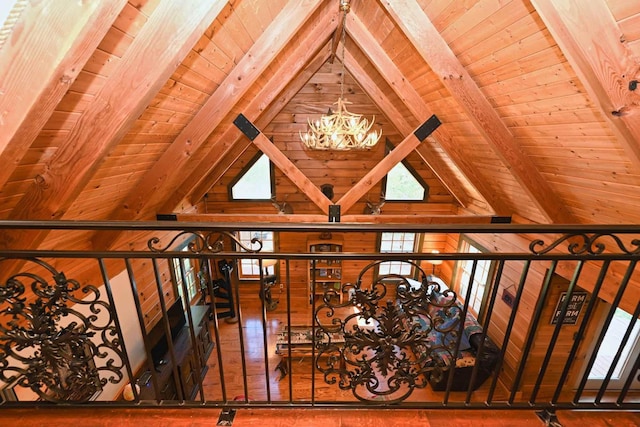 interior space with beam ceiling and wood ceiling