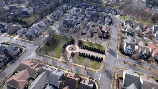 birds eye view of property with a residential view