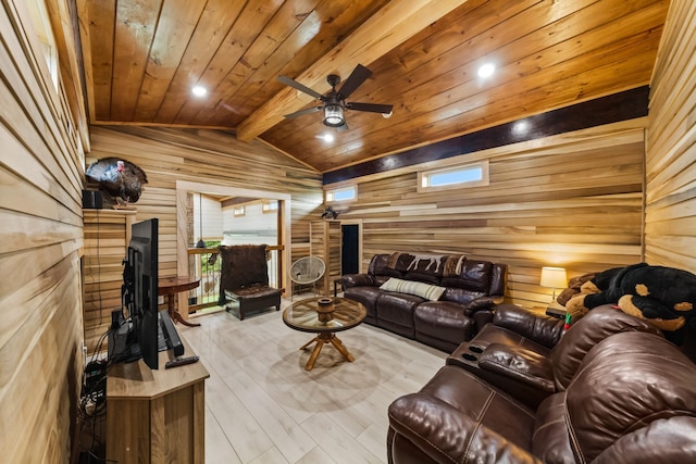 living room with vaulted ceiling with beams, wood walls, wood ceiling, and ceiling fan