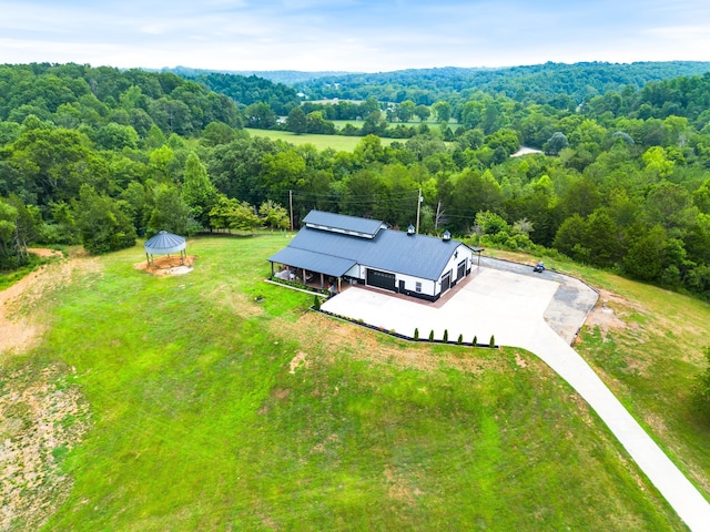 bird's eye view with a forest view