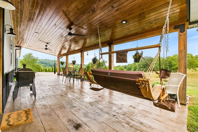 view of patio / terrace featuring ceiling fan