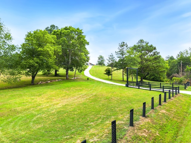 view of property's community featuring a yard