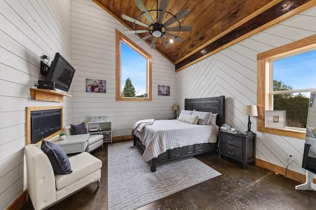 bedroom with a fireplace, baseboards, wood walls, and high vaulted ceiling