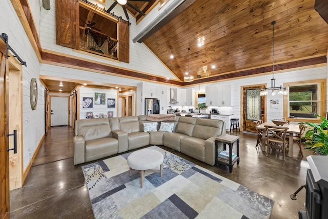 living room with finished concrete floors, a barn door, wooden ceiling, and high vaulted ceiling