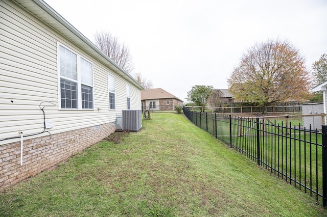 view of yard featuring cooling unit and a fenced backyard