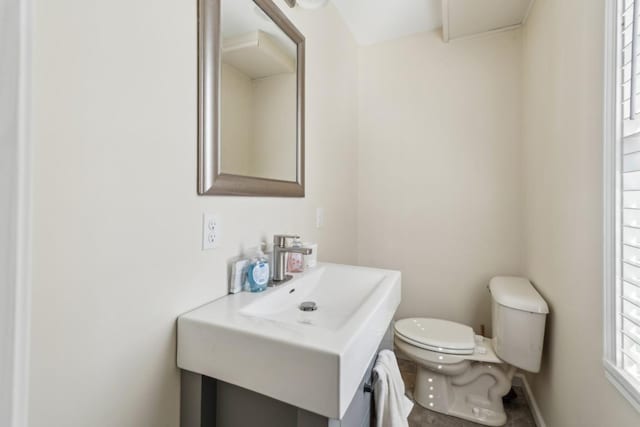 315B Bill Hunter Rd, Celina, TN 38551 - bathroom with toilet, baseboards, and a sink