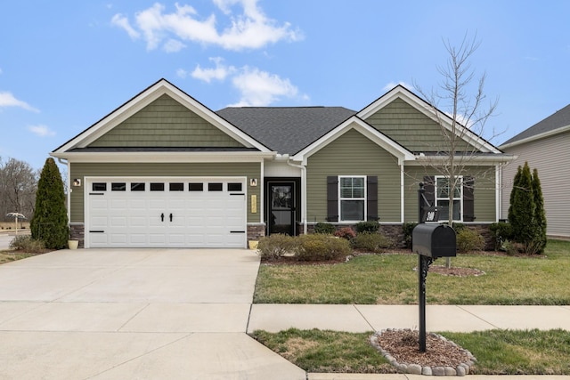 craftsman inspired home with stone siding, an attached garage, driveway, and a front lawn