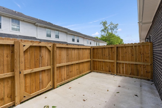 view of patio / terrace featuring fence