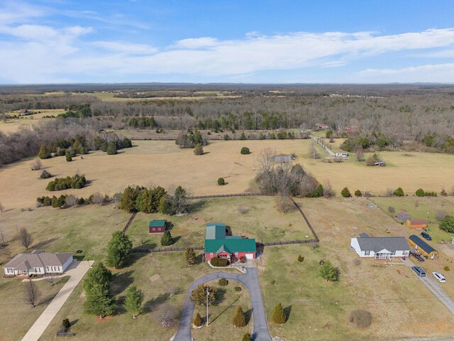 birds eye view of property featuring a rural view