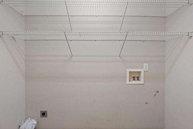 laundry room with hookup for a washing machine, hookup for an electric dryer, and laundry area