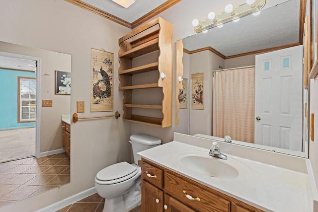 bathroom featuring tile patterned flooring, toilet, vanity, and ornamental molding