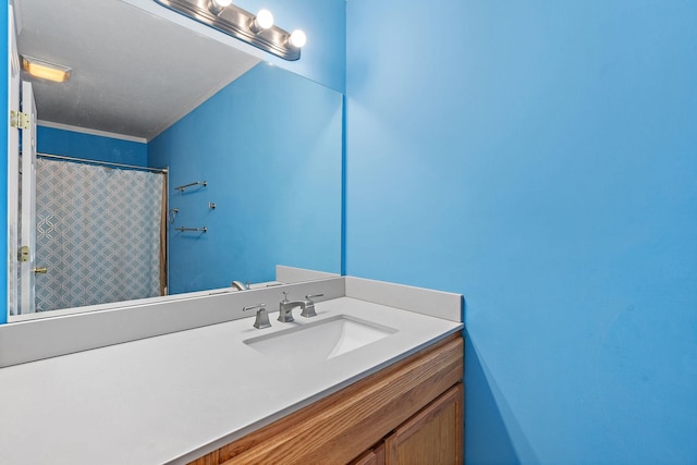 full bathroom featuring vanity and a shower with curtain