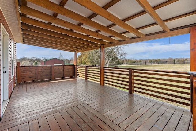 wooden terrace featuring fence