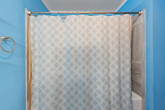 bathroom with a textured ceiling