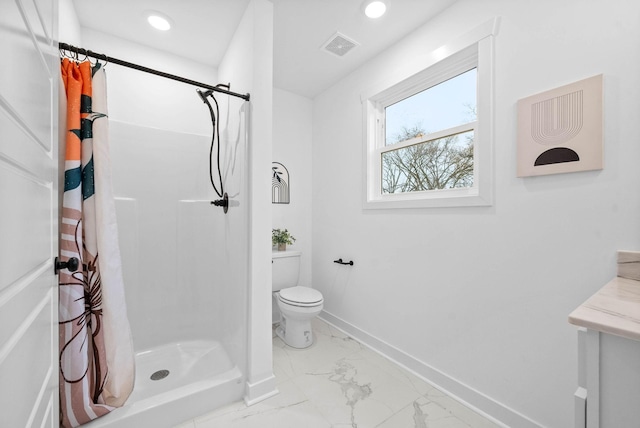 bathroom featuring visible vents, baseboards, a stall shower, toilet, and marble finish floor